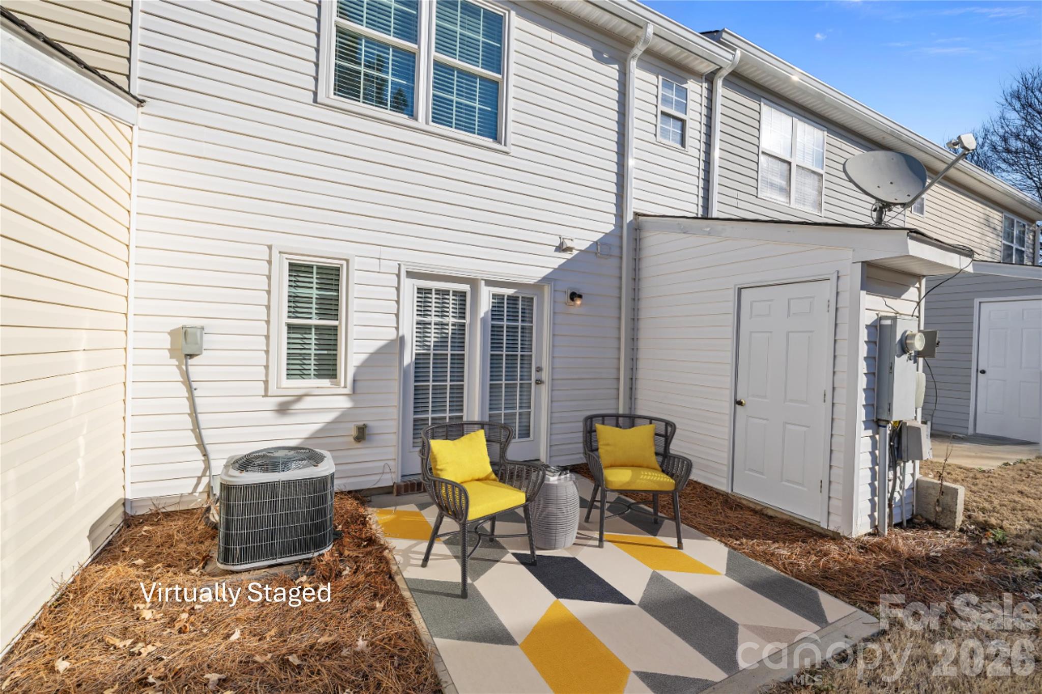 209 Primrose Walk Fort Mill, SC 29715 - Photo 29 of 39 a backyard of a house with barbeque oven table and chairs