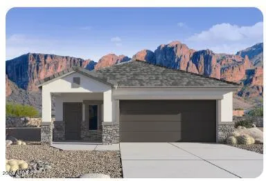 a view of a house with a garage and a fireplace