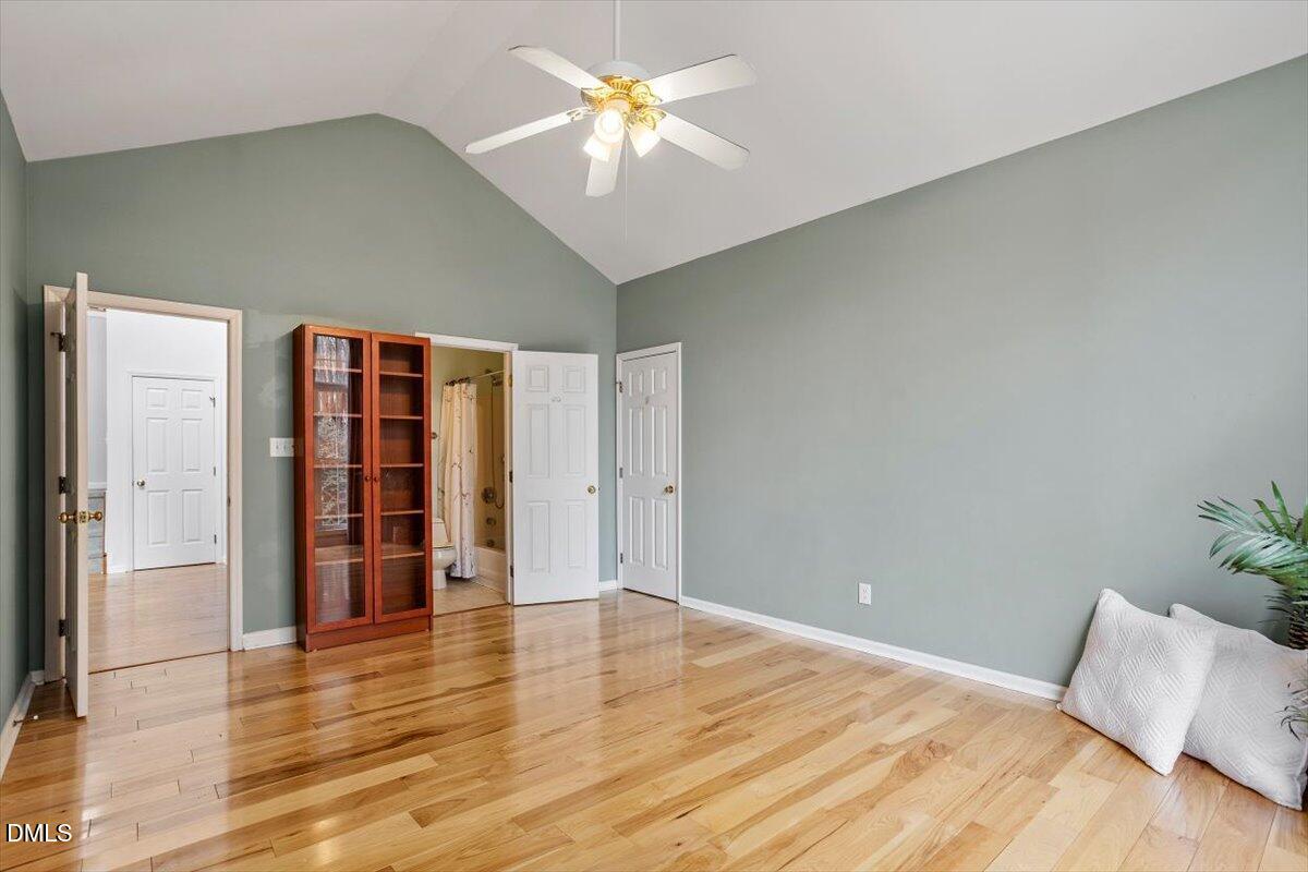 2804 Shofield Court Raleigh, NC 27615 - Photo 13 of 37 a view of an empty room with window and a kitchen