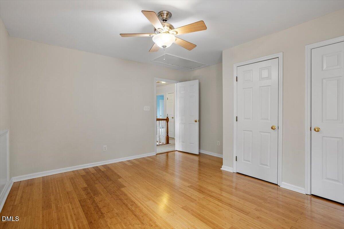 2804 Shofield Court Raleigh, NC 27615 - Photo 23 of 37 wooden floor in an empty room