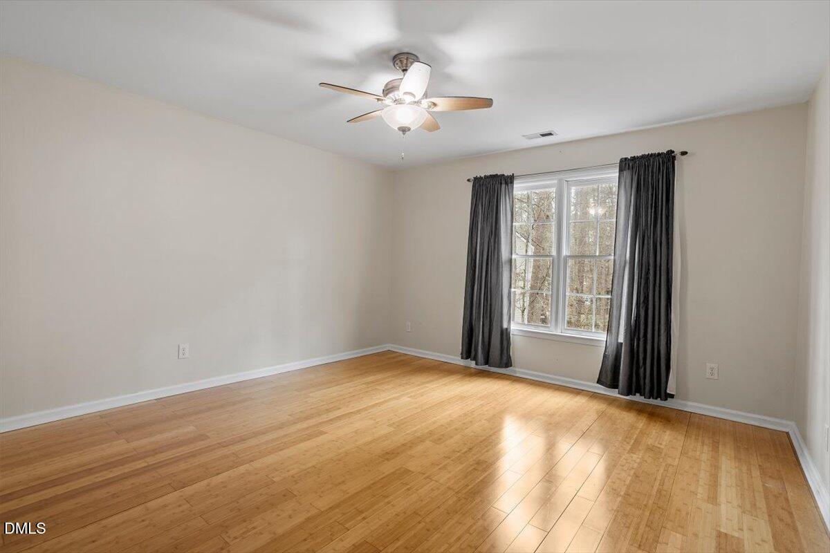 2804 Shofield Court Raleigh, NC 27615 - Photo 26 of 37 a view of an empty room with glass door