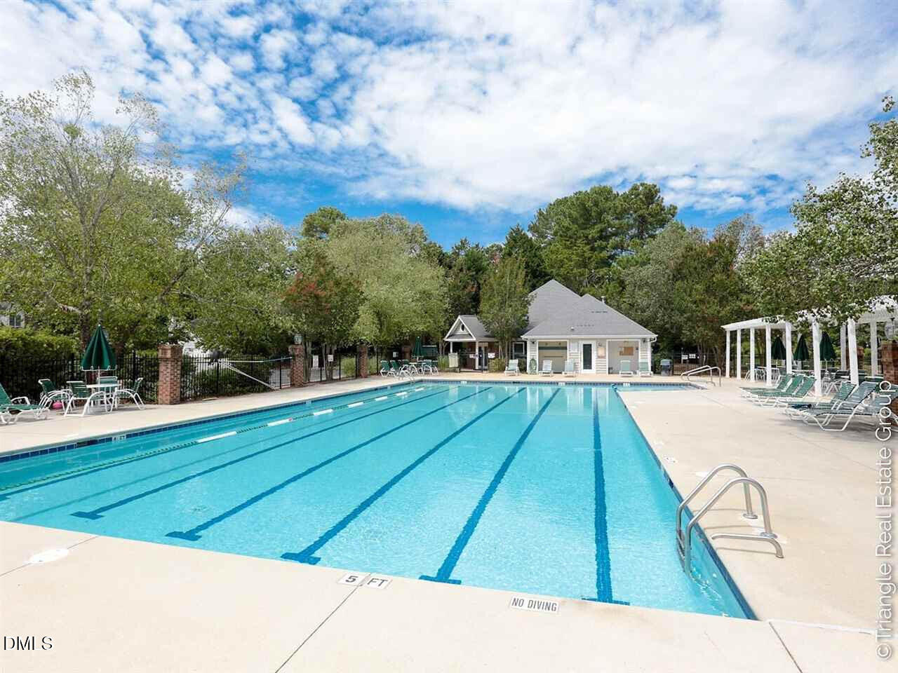 2804 Shofield Court Raleigh, NC 27615 - Photo 32 of 37 a view of swimming pool with a yard