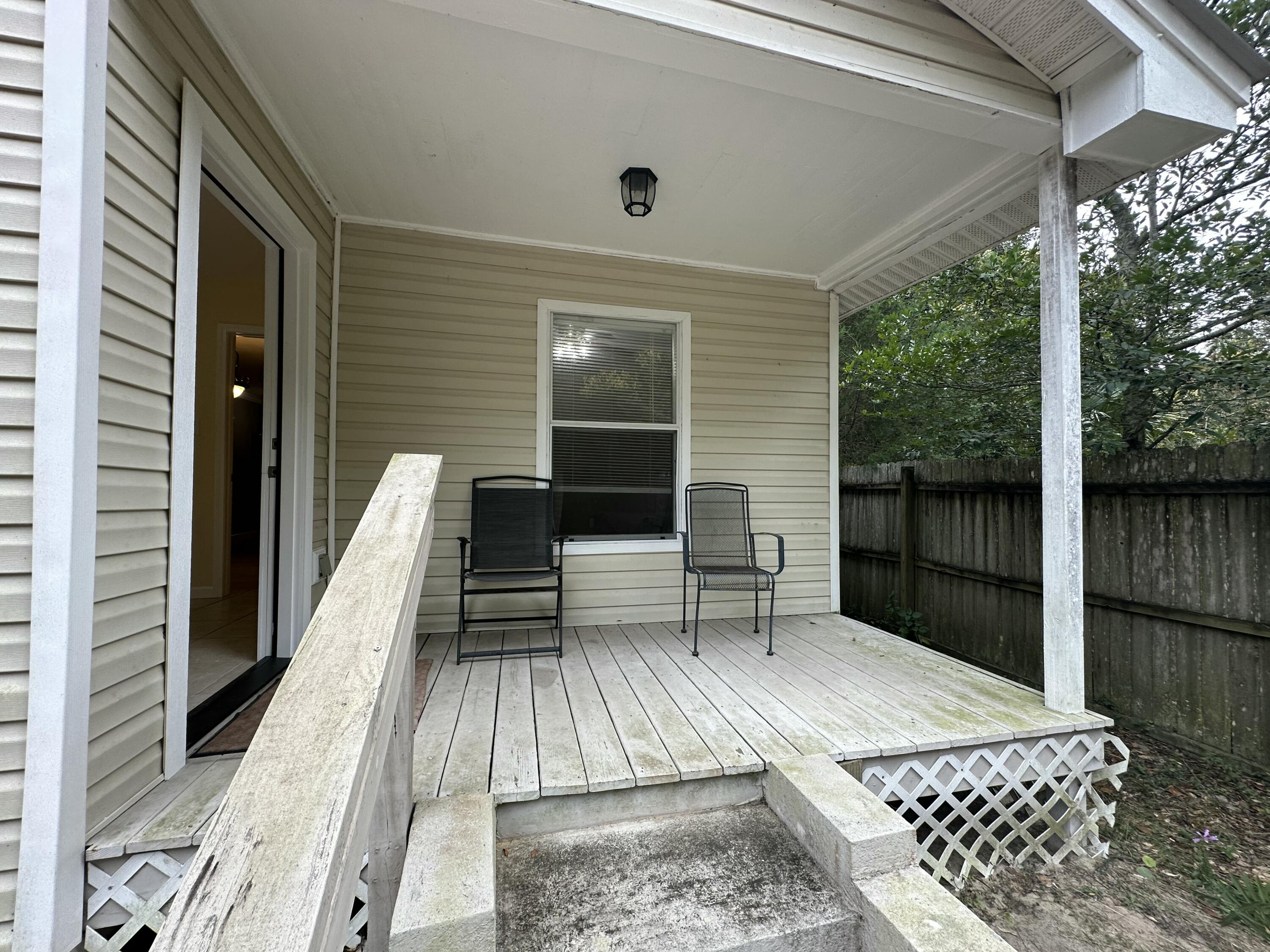 120 North Davis Lane DeFuniak Springs, FL 32433 - Photo 47 of 58 a balcony view with a outdoor seating space