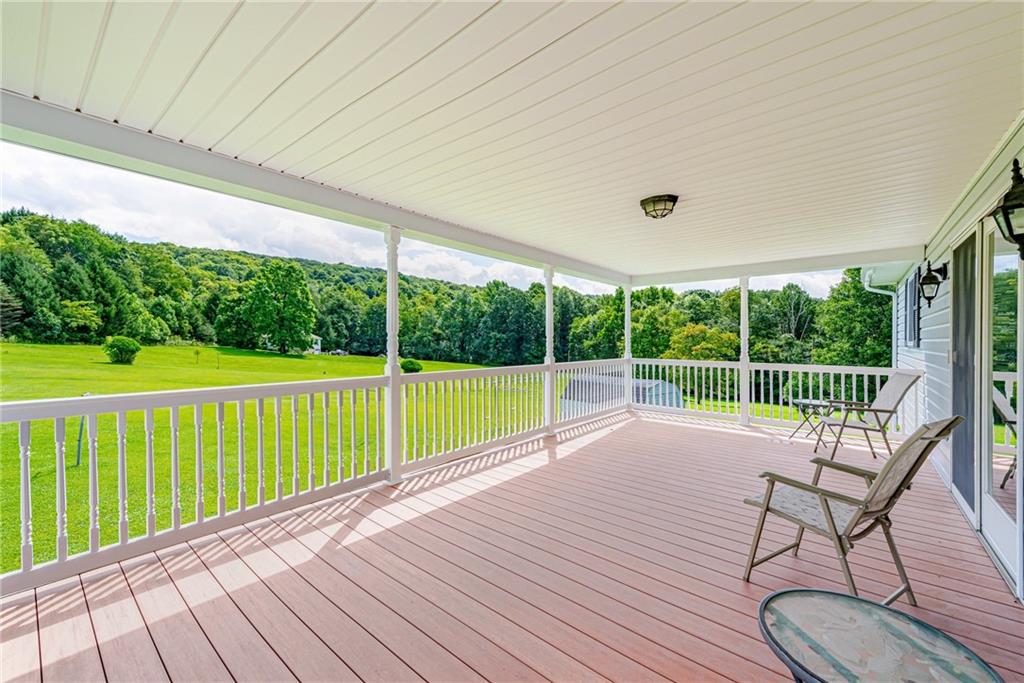 514 White Road Normalville, PA 15469 - Photo 13 of 32 a view of a chairs and table in the balcony