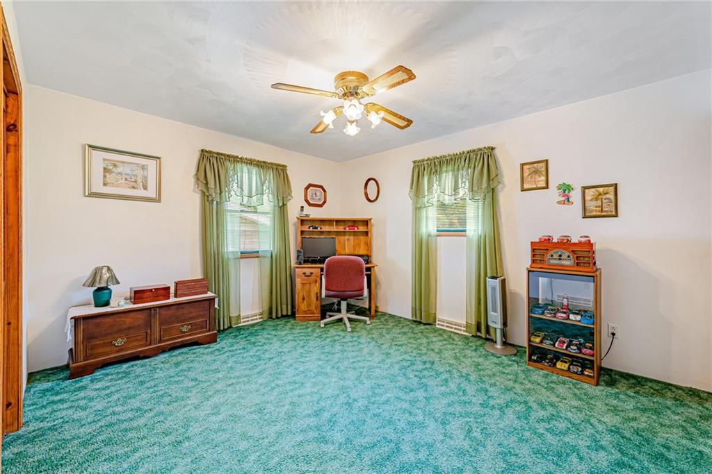 514 White Road Normalville, PA 15469 - Photo 20 of 32 a living room with furniture and a chandelier