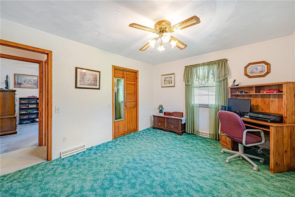 514 White Road Normalville, PA 15469 - Photo 21 of 32 a view of a workspace with furniture and a chandelier