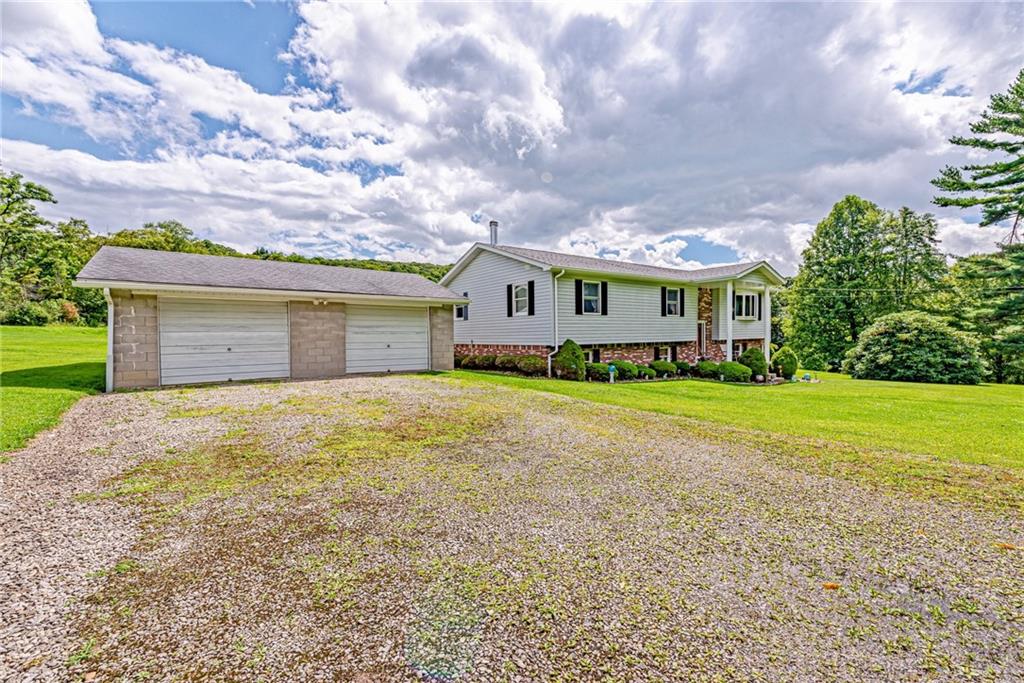 514 White Road Normalville, PA 15469 - Photo 24 of 32 a front view of house with yard