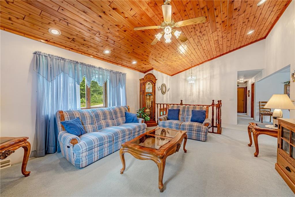 514 White Road Normalville, PA 15469 - Photo 5 of 32 a living room with furniture a ceiling fan and a window