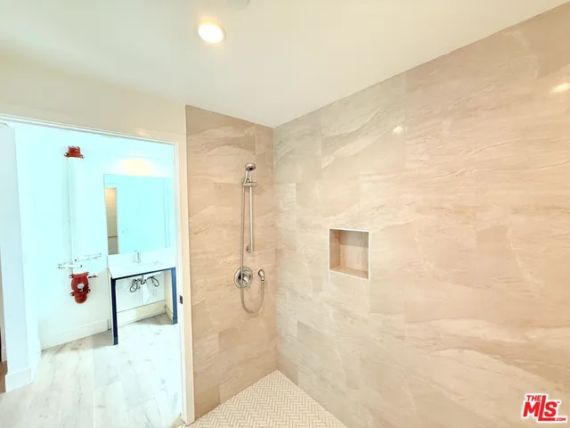 a room with a table and a mirror