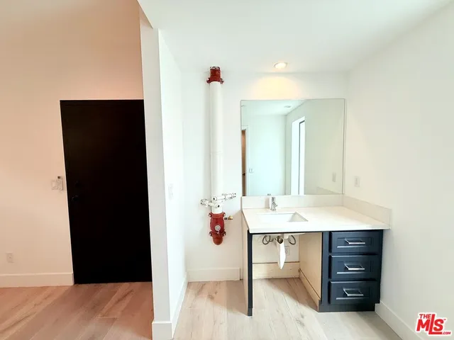 a view of a hallway with staircase