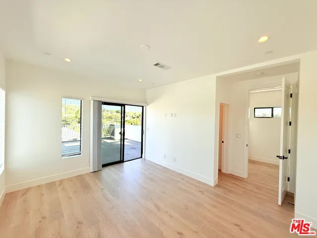 a view of hallway with shower