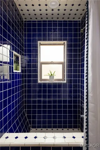 a view of a door with wooden floor