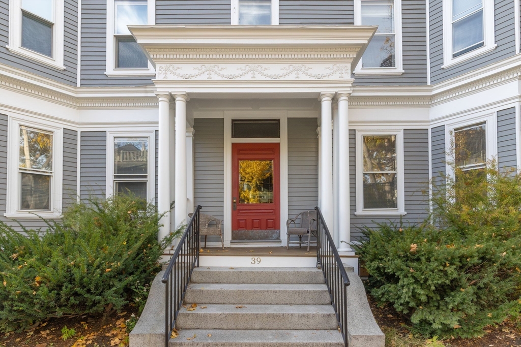 39 Ellery Street, Unit 6 Cambridge, MA 02138 - Photo 2 of 14 a front view of a house with potted plants