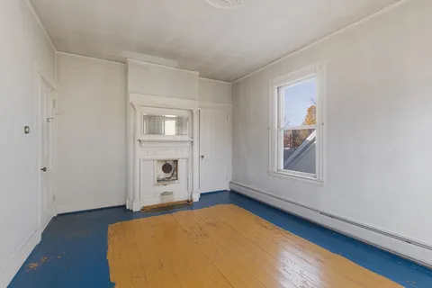 an empty room with windows