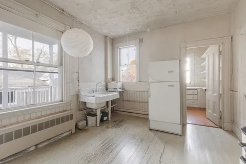 a room with a chair and a table