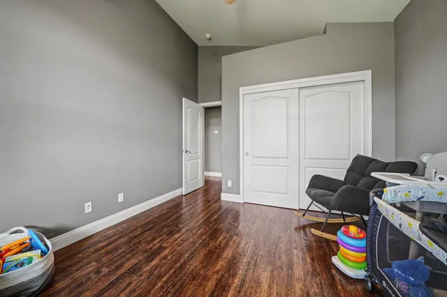 a room with furniture and wooden floor