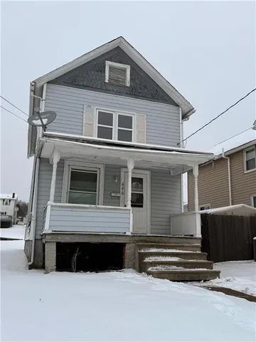 a front view of a house with a balcony