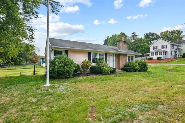 a house view with a garden space