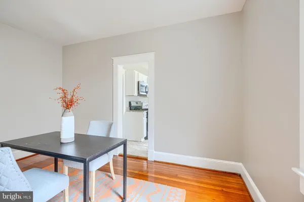 a kitchen with a refrigerator stove and microwave