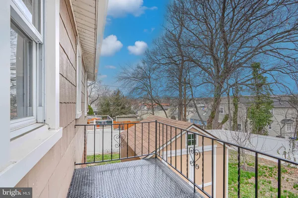 a bedroom with a bed and a table in it