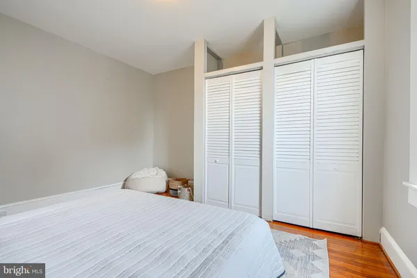 a room with a sink and a mirror