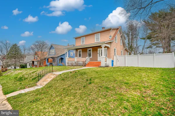 a outdoor view of a house with a porch