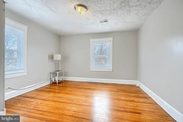 a kitchen with a refrigerator stove and microwave