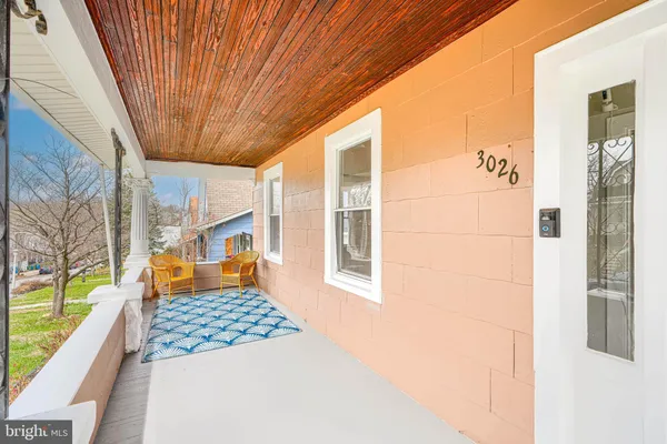 a view of livingroom with hardwood floor and hallway