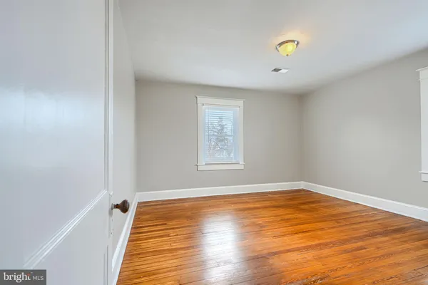 a view of a backyard with potted plants