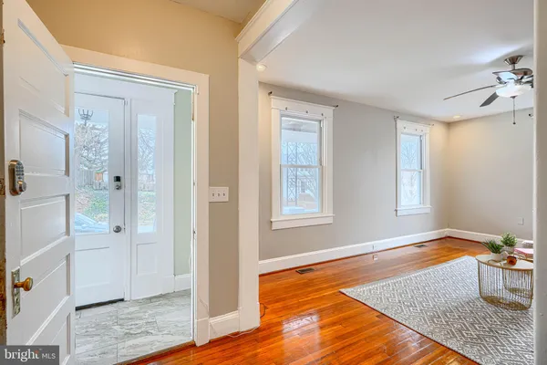 a room with furniture and a rug