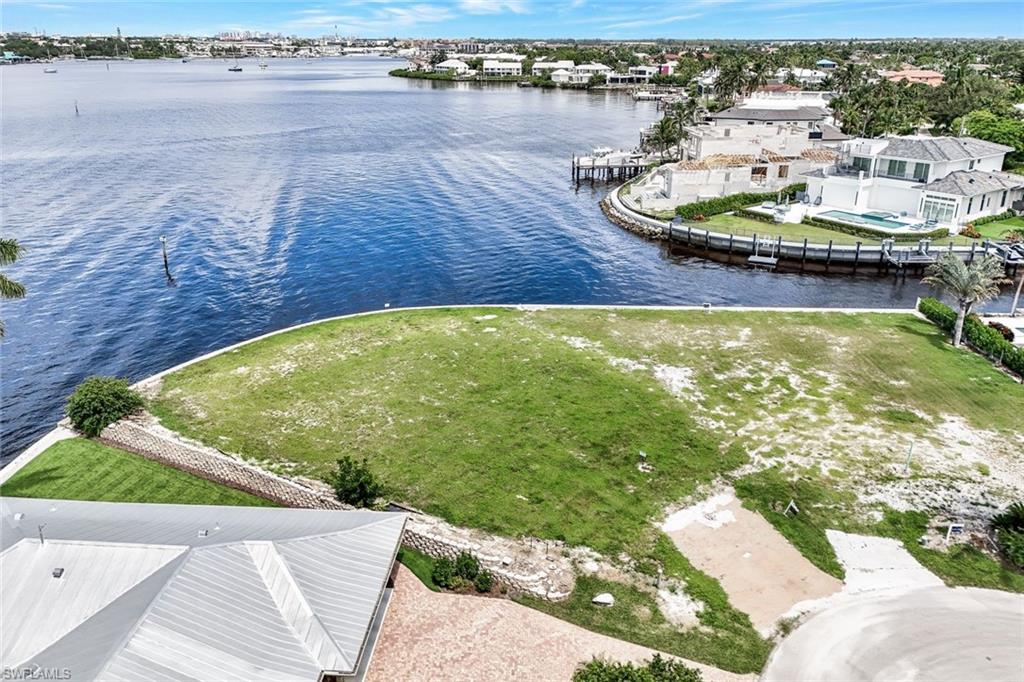 1303 Marlin Drive Naples, FL 34102 - Photo 11 of 15 Birds eye view of property featuring a water view