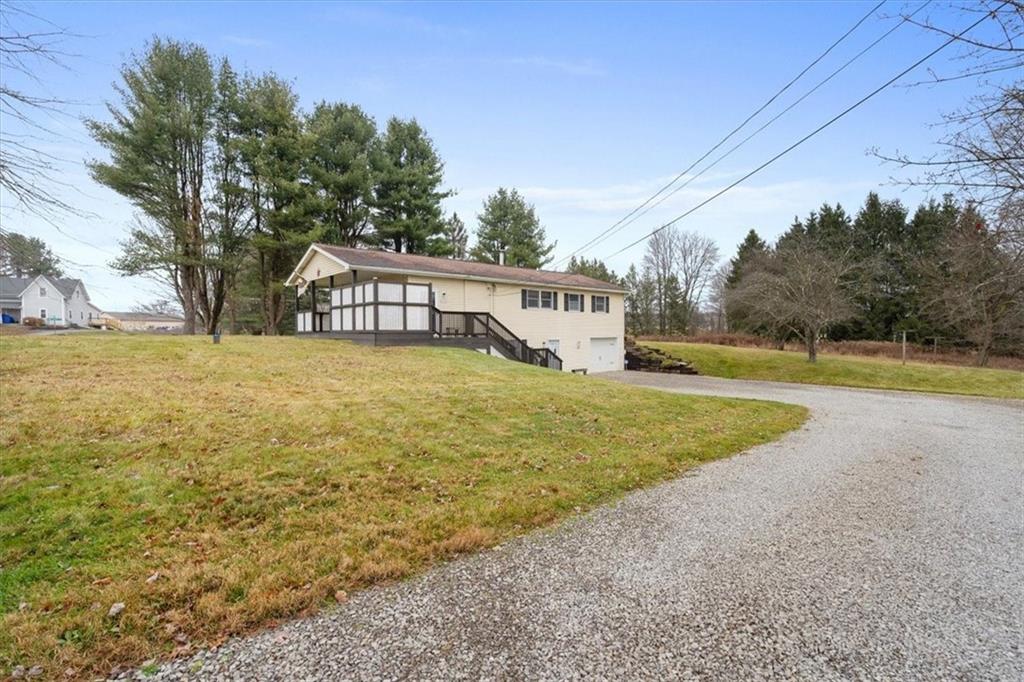 a view of a yard with a slide