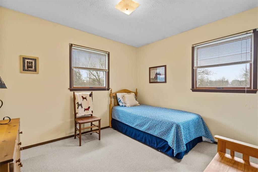 173 Amsterdam Road Grove City, PA 16127 - Photo 15 of 25 a bedroom with a bed and a window