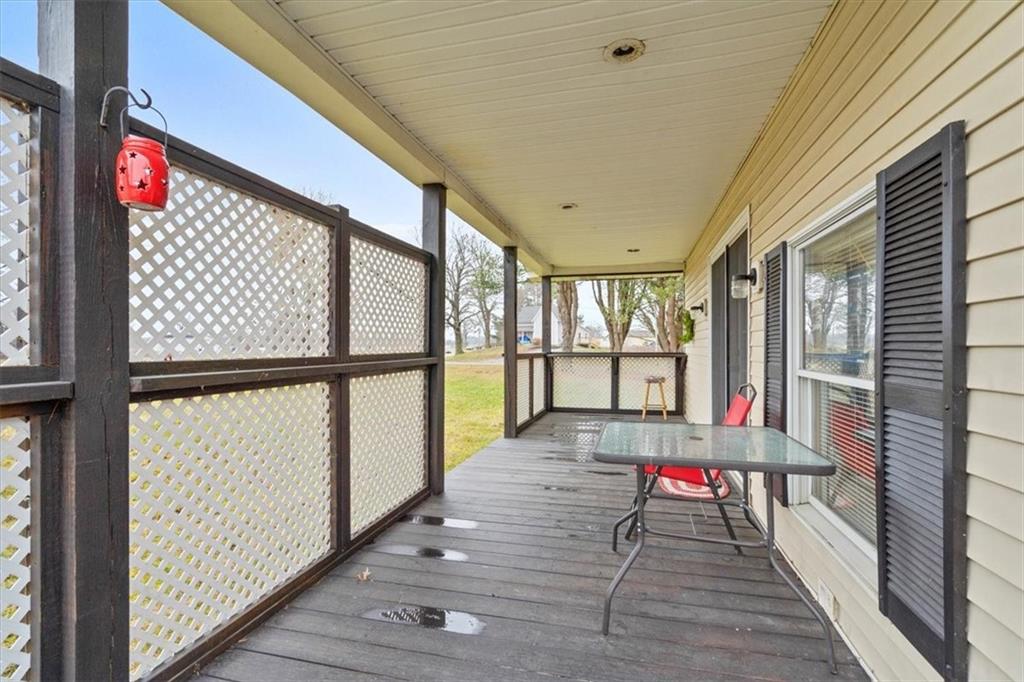 173 Amsterdam Road Grove City, PA 16127 - Photo 2 of 25 a room with wooden floor and windows