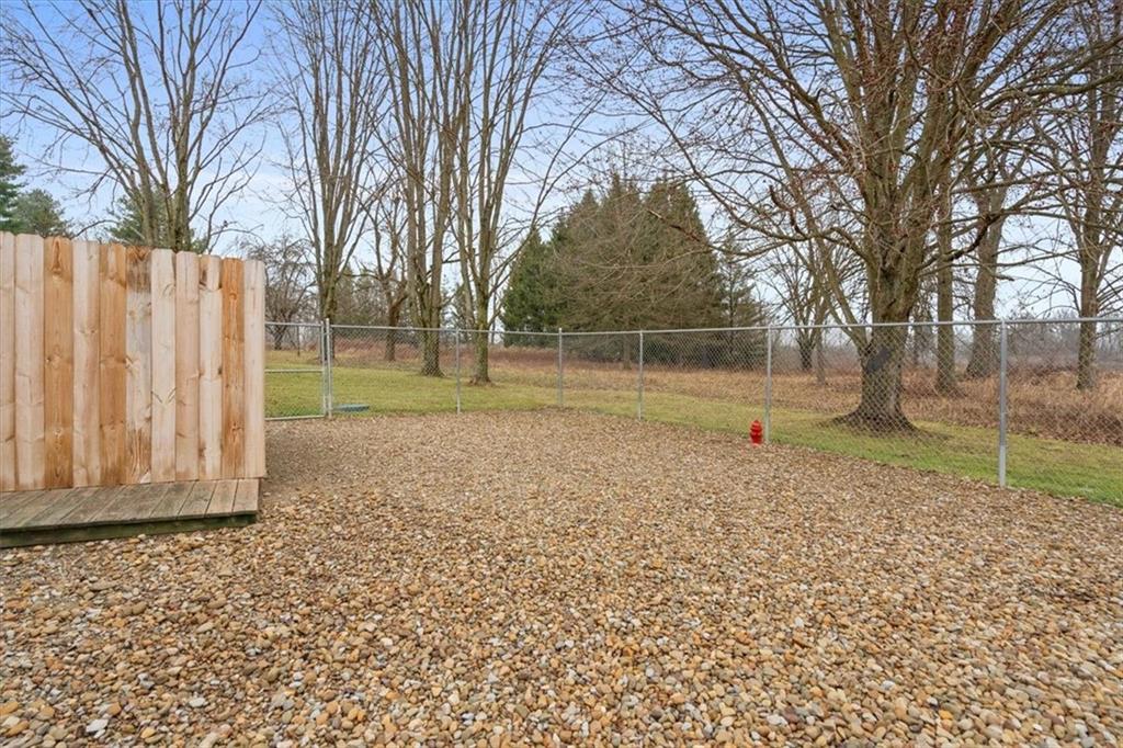 173 Amsterdam Road Grove City, PA 16127 - Photo 23 of 25 a backyard of a house with lots of green space
