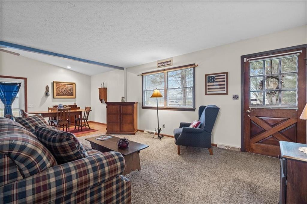 173 Amsterdam Road Grove City, PA 16127 - Photo 3 of 25 a living room with furniture and a window