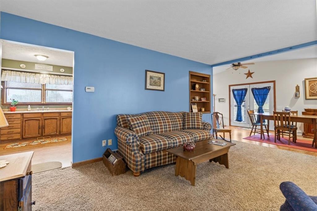 173 Amsterdam Road Grove City, PA 16127 - Photo 5 of 25 a bedroom with furniture and a rug