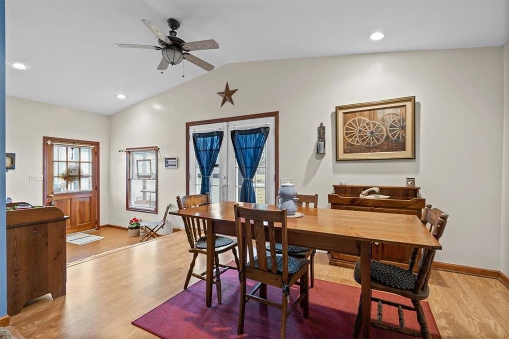 173 Amsterdam Road Grove City, PA 16127 - Photo 8 of 25 a view of a dining room with furniture and wooden floor