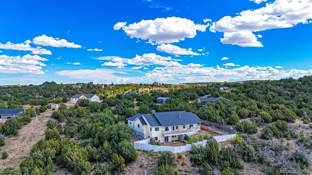 a view of a city with lots of green space