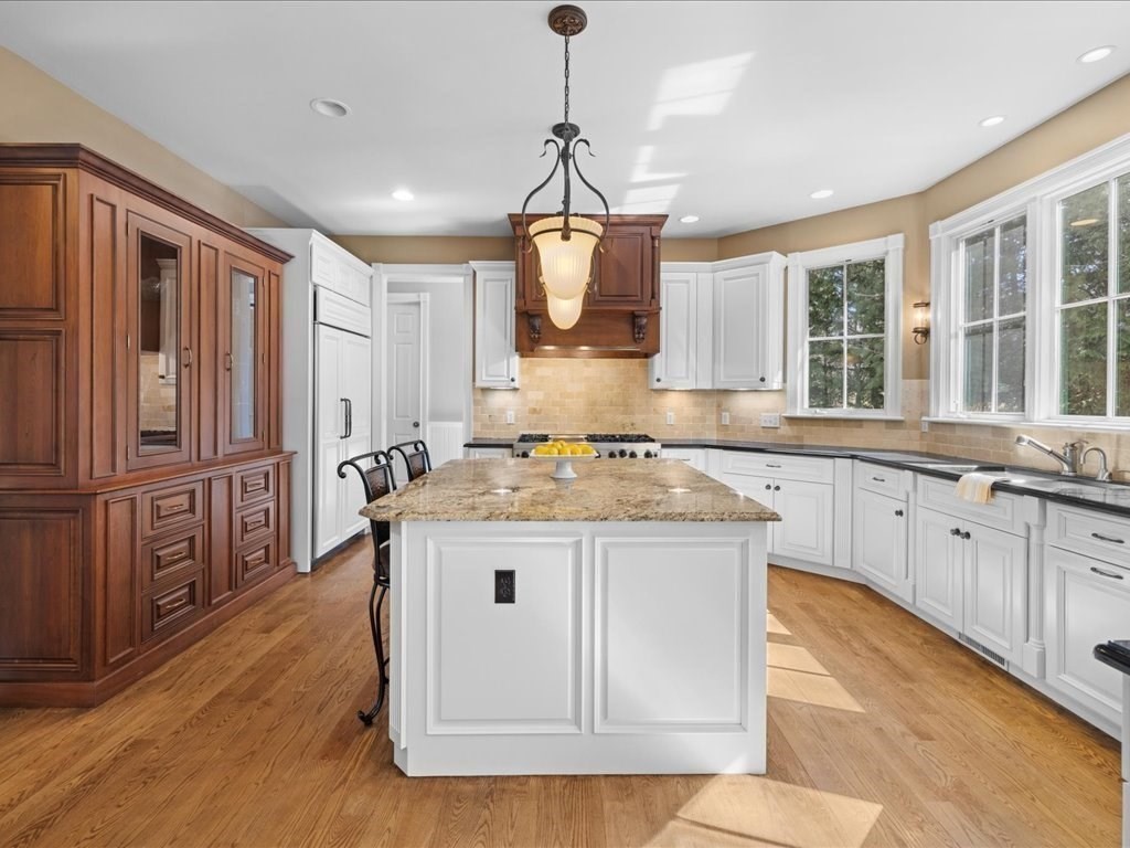 2 Copperbeech Circle Westborough, MA 01581 - Photo 14 of 42 a kitchen with stainless steel appliances granite countertop a sink a stove a refrigerator and cabinets