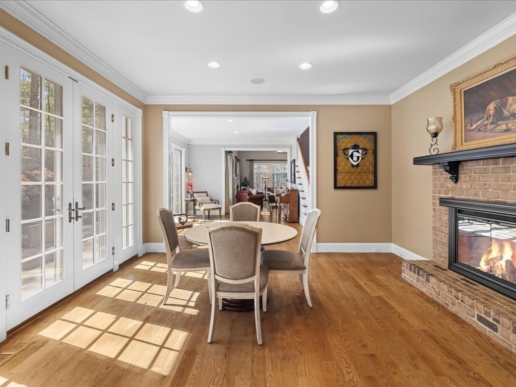 2 Copperbeech Circle Westborough, MA 01581 - Photo 15 of 42 a dining room with furniture a fireplace and wooden floor