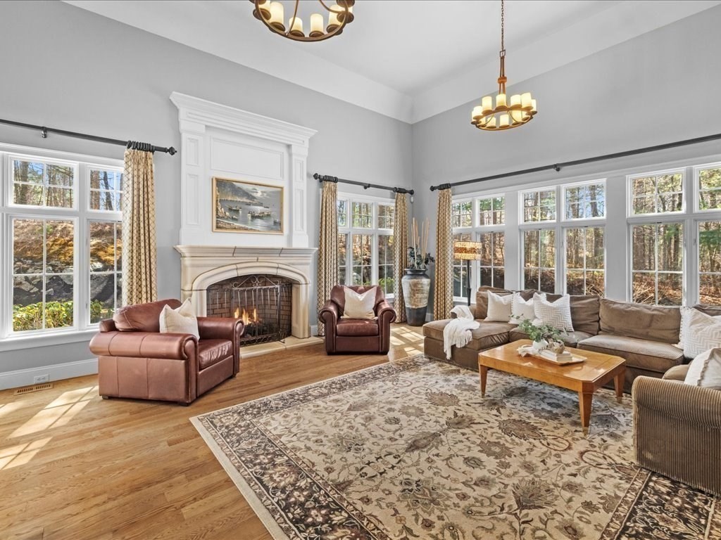 2 Copperbeech Circle Westborough, MA 01581 - Photo 18 of 42 a living room with furniture and a fireplace