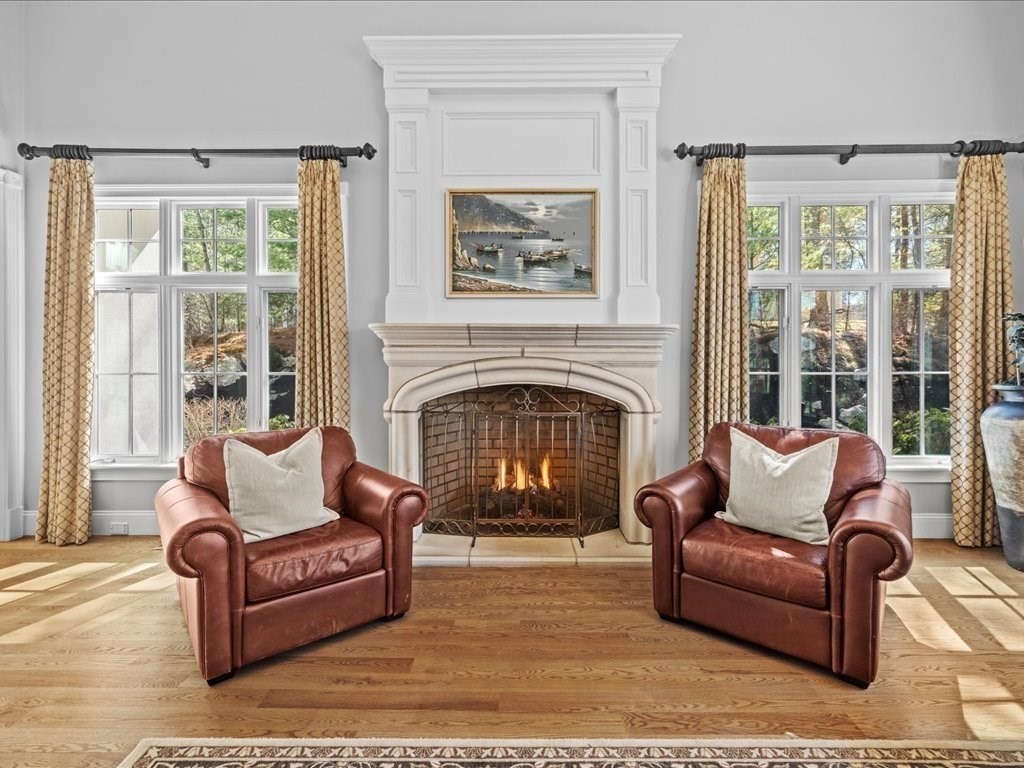 2 Copperbeech Circle Westborough, MA 01581 - Photo 19 of 42 a living room with furniture and a fireplace