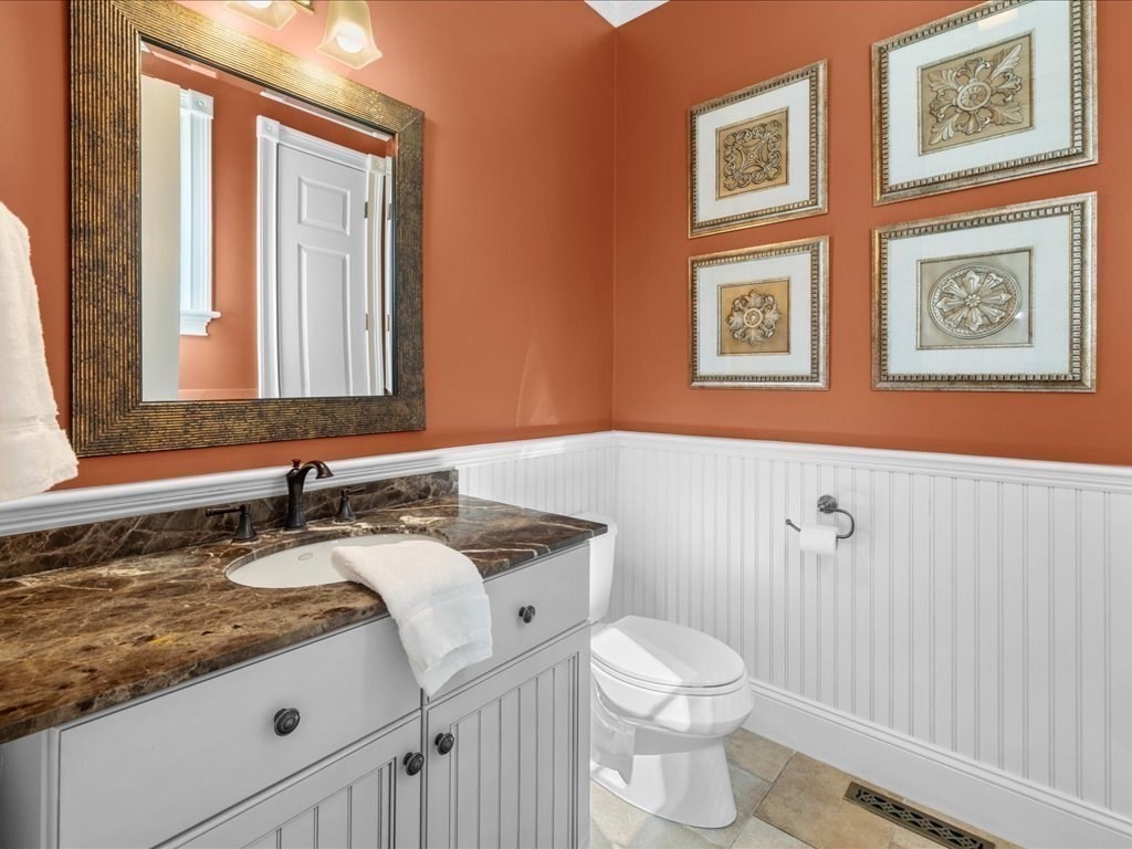 2 Copperbeech Circle Westborough, MA 01581 - Photo 20 of 42 a bathroom with a granite countertop sink mirror vanity and toilet