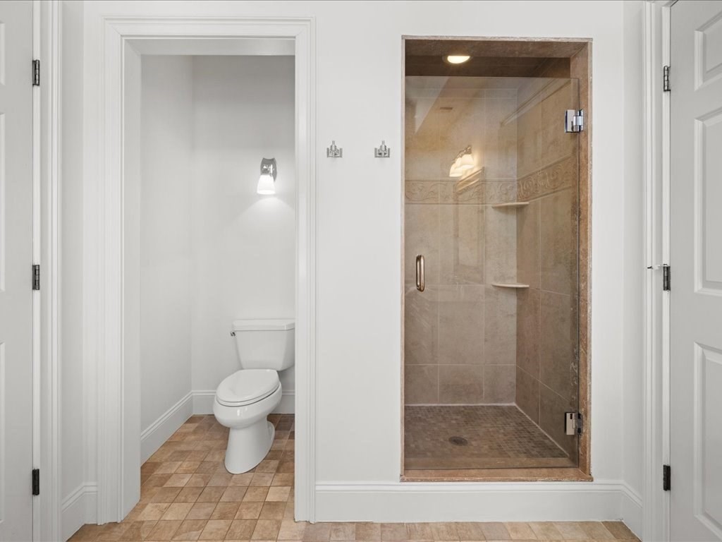 2 Copperbeech Circle Westborough, MA 01581 - Photo 25 of 42 a bathroom with a shower and a toilet