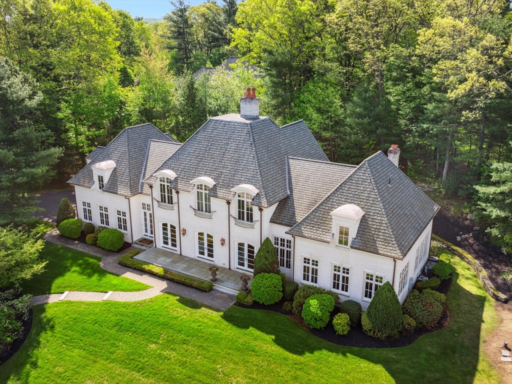 2 Copperbeech Circle Westborough, MA 01581 - Photo 3 of 42 a aerial view of a house next to a big yard and large trees