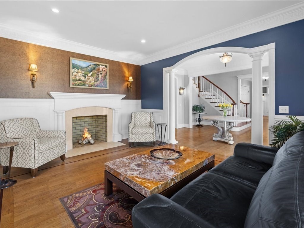 2 Copperbeech Circle Westborough, MA 01581 - Photo 8 of 42 a living room with furniture and a fireplace