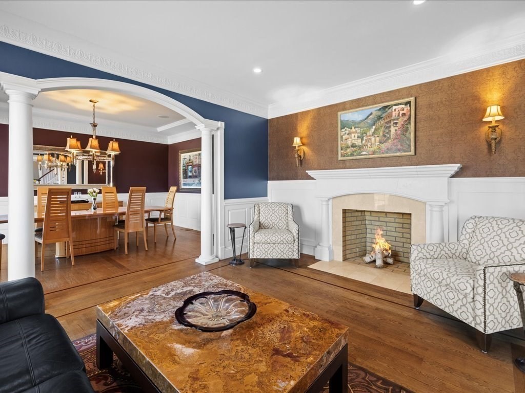 2 Copperbeech Circle Westborough, MA 01581 - Photo 9 of 42 a living room with furniture and a fireplace