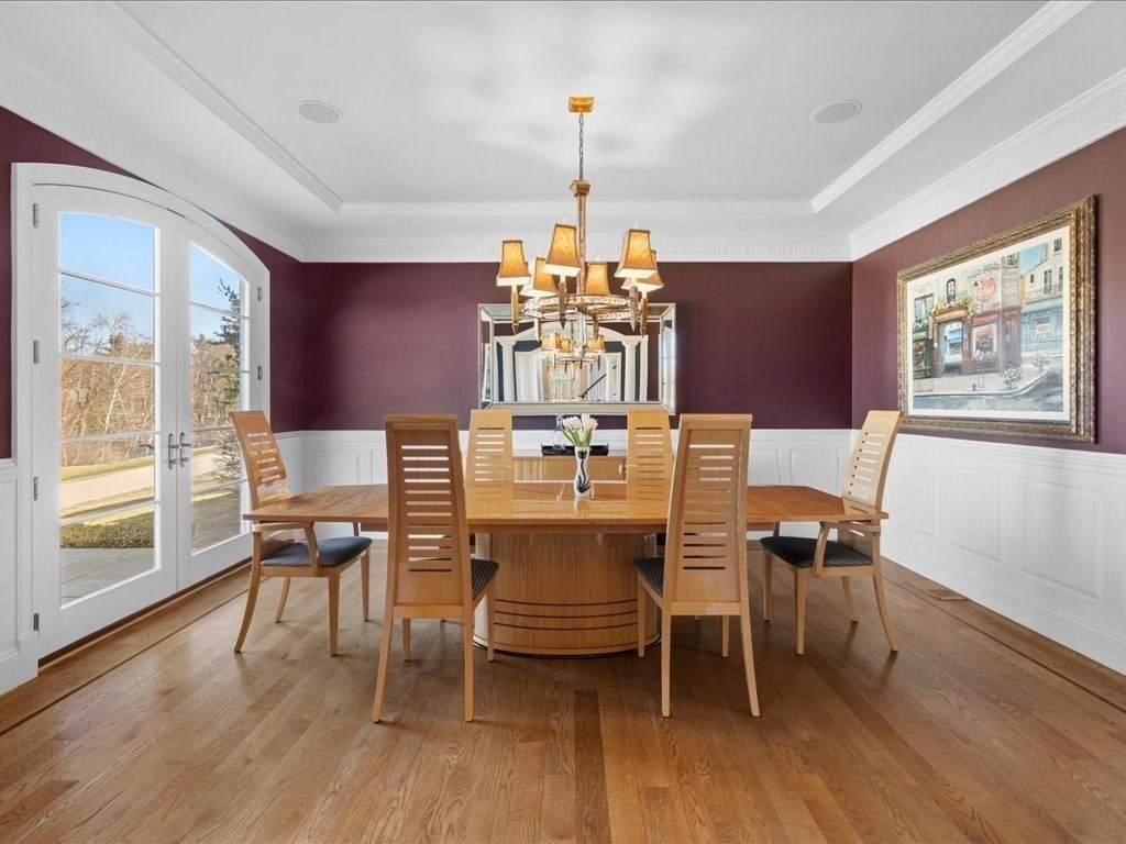 2 Copperbeech Circle Westborough, MA 01581 - Photo 10 of 42 a view of a dining room with furniture window and wooden floor