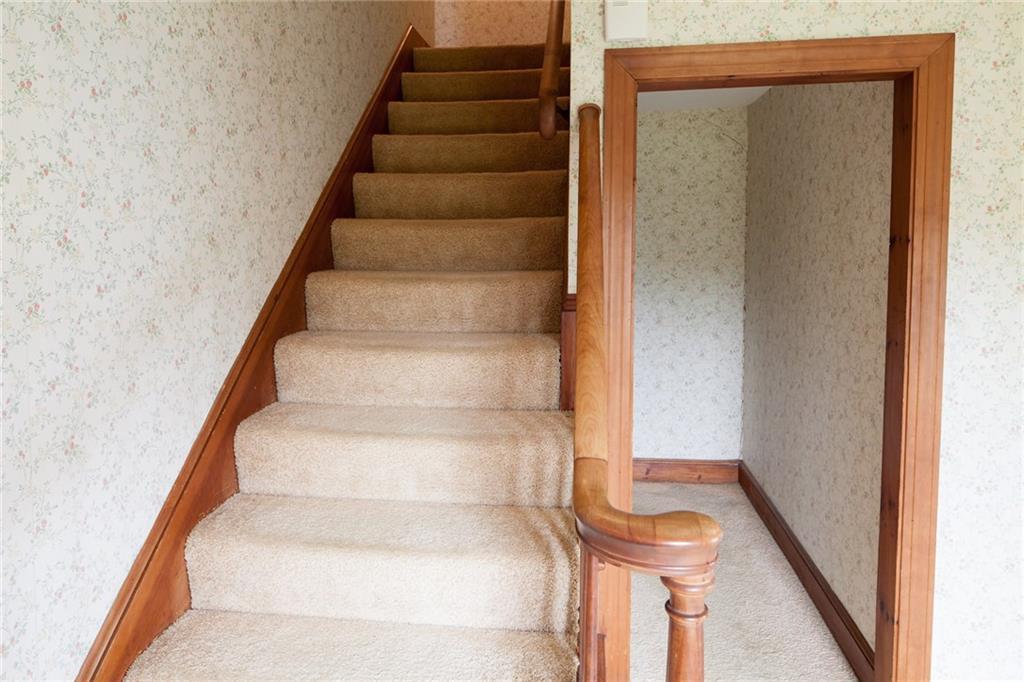 755 Shore Road Cape Neddick, ME 03902 - Photo 12 of 35 The stairway leads to the upstairs...